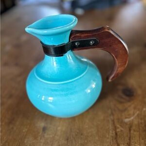 Mid century iconic ceramic vintage carafe w/ wooden handle.